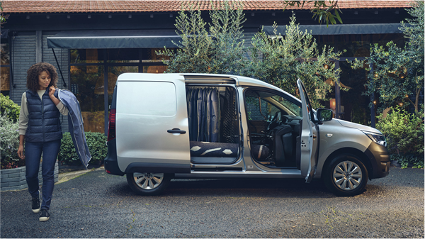 A man unloading goods from a DOKKER Van